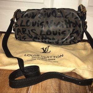Louis Vuitton small purse with leather tassel