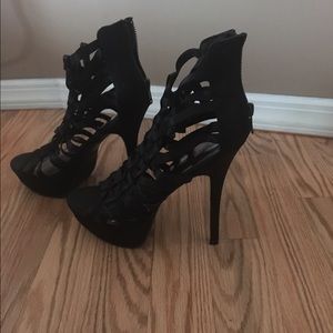 Black strappy high heels