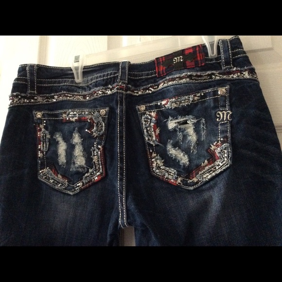 MISS ME signature boot jeans.