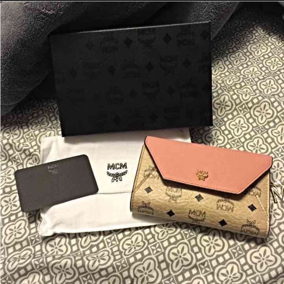 MCM wallet - nwt- retail w/MCM charm attached HOLD