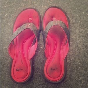 Pink NIKE flip flops