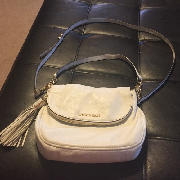 White Michael Kors shoulder and crossbody bag.