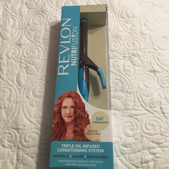 Revlon curling iron. Brand new.