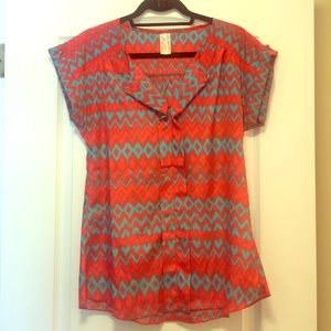 Teal and pink patterned shirt