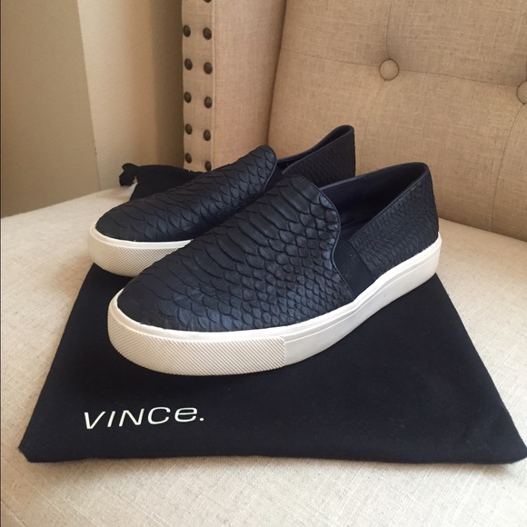 navy blue slip on sneakers