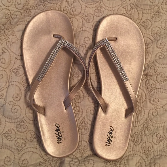 Gold rhinestone flip flops