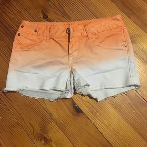 White/orange ombre jean shorts