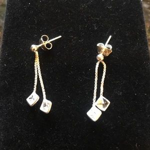 Silver toned earrings