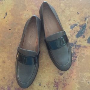 Cute brown and black Madewell loafers.