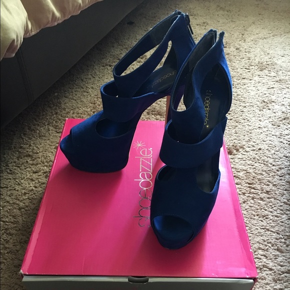 Blue 5 inch blue heels.  Worn only once.