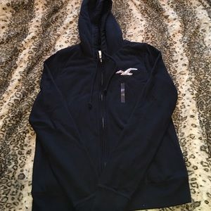 A zip up Hollister jacket with fur inside. New
