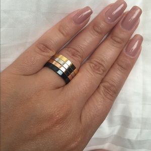Four linked stainless steel rings