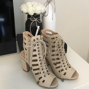 Nude lace up heels