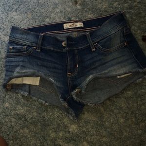 Medium wash short short jean shorts.