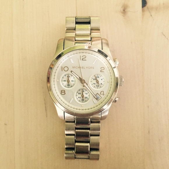 Michael Kors watch pre-owned,good condition, w/box
