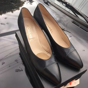 Chanel navy and black pumps