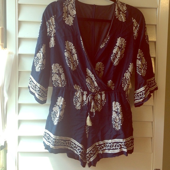 Navy romper with cream paisley print