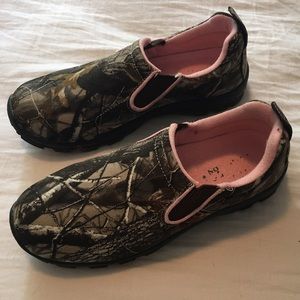 Camo and pink slip-on shoes