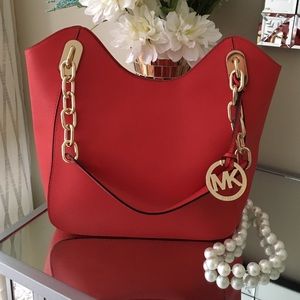 On Hold! Don't buyMichael Kors orange summer purse