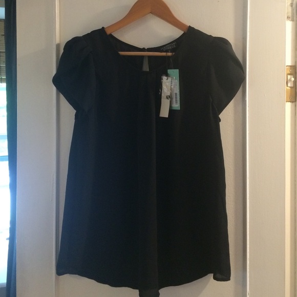 Sheer short sleeve blouse.