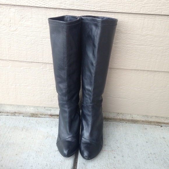 Black knee high heeled boots