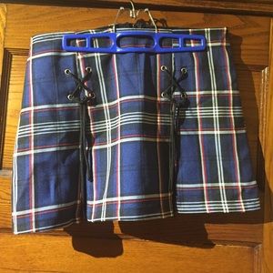 Blue pleated plaid mini skirt