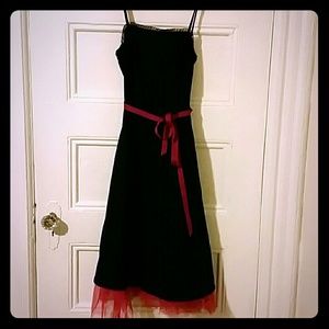 Black dress with pink tulle underskirt