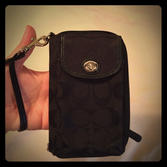 Coach wristlet wallet with phone holder.