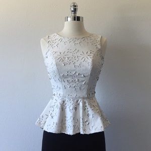 Laser Cut Peplum Top