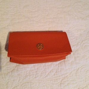 Orange Tory Burch sunglasses case