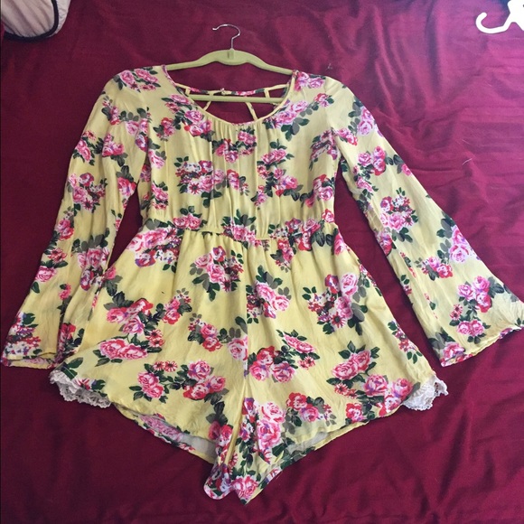 Yellow long-sleeved romper from Charlotte Russe