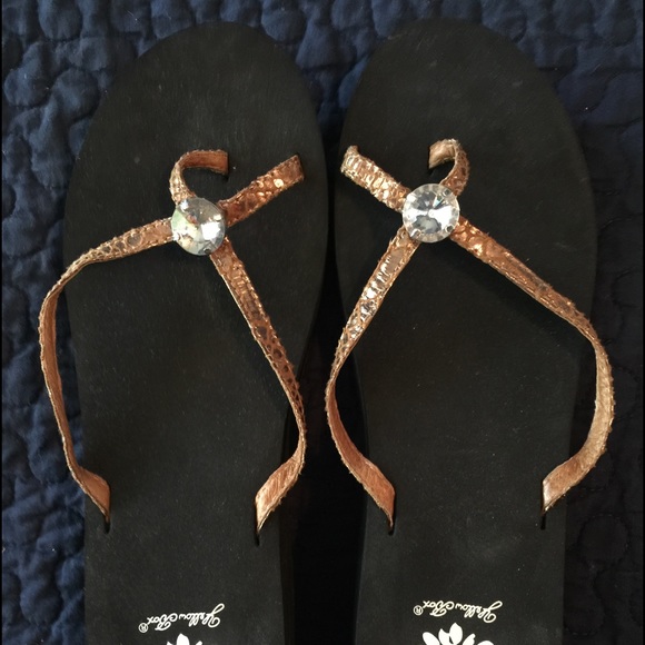 Yellow box flip flops