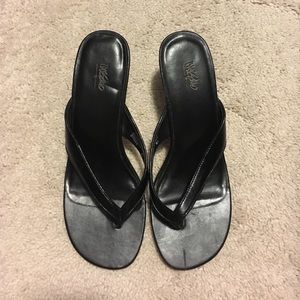 Black heeled flip flop sandals