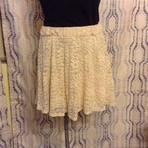 Wet seal cream lace mini skirt