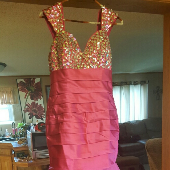 Beautiful Dark Pink size 14 never altered or worn.