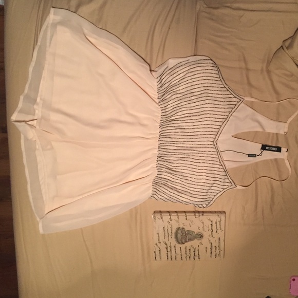 Light pink romper with silver beading