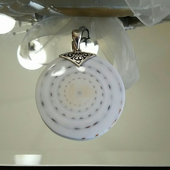 SOLD-GENUINE WHITE ONYX AND SILVER MEDALLION