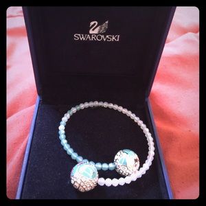 Swarovski Jewelry - SWAROVSKI pink & turquoise crystal bracelet. Swarovski Jewelry - SWAROVSKI pink & turquoise crystal bracelet.