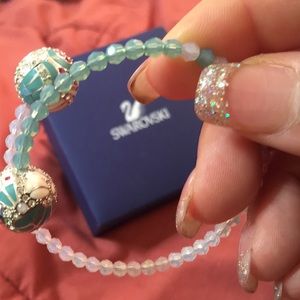 Swarovski Jewelry - SWAROVSKI pink & turquoise crystal bracelet. Swarovski Jewelry - SWAROVSKI pink & turquoise crystal bracelet.