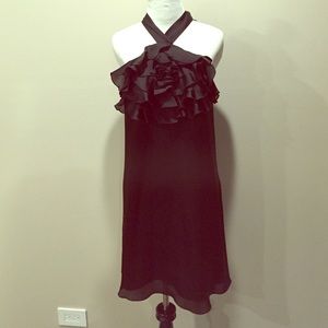 Black satin dress with flower embellishment