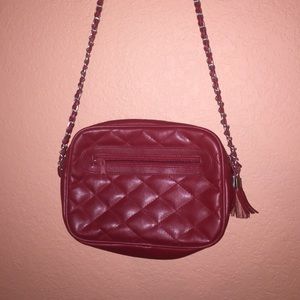red shoulder purse with hanging tassels!