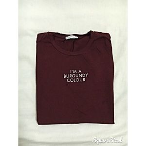 I'm a burgundy color tee