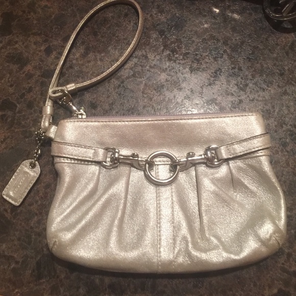 Cute Coach Wristlets in good condition.