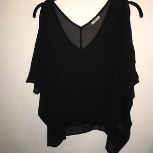 oversized sheer top with cut out arms