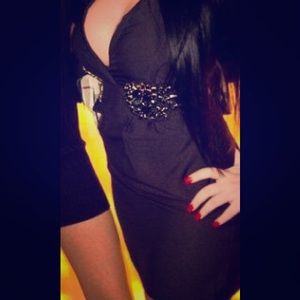 Black dress with studded waistline