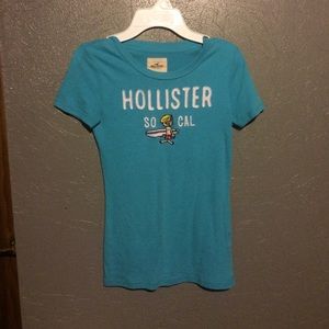 A blue hollister shirt