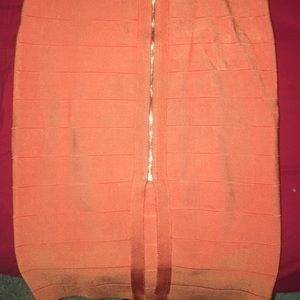 BeBe two piece fitted skirt with half top