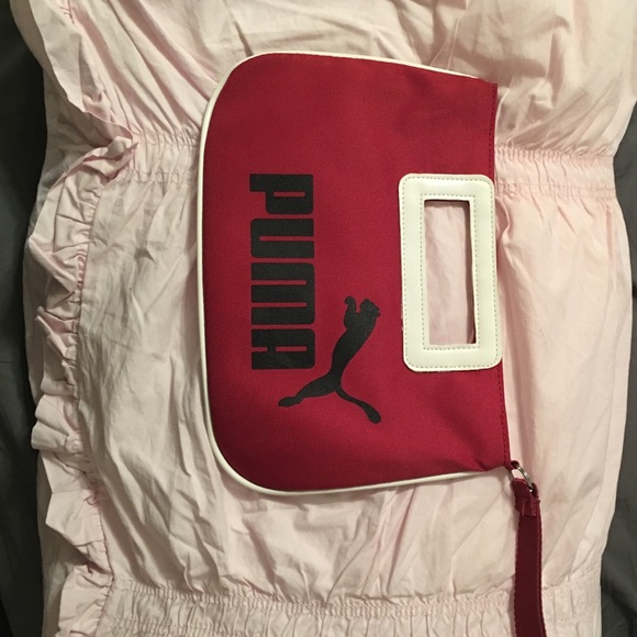 Puma clutch wristlet