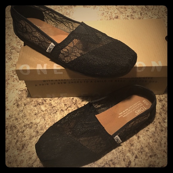 Black lace TOMS.