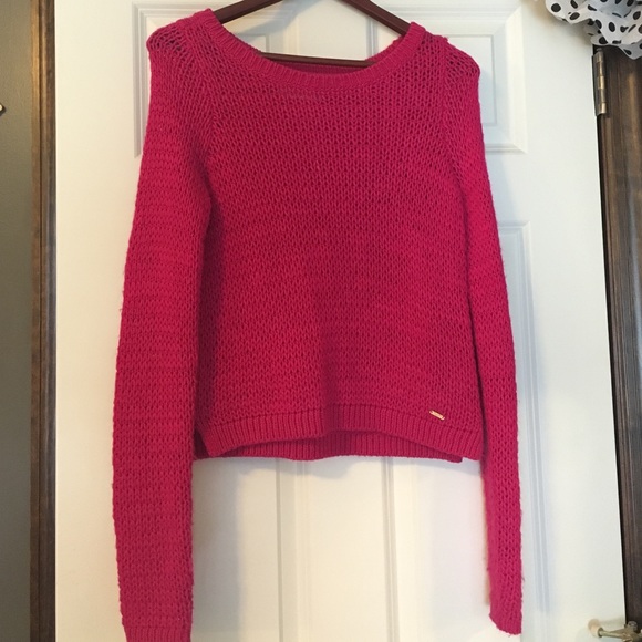 Pink crochet sweater.
